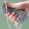 exfoliatingshowerspongegray.png