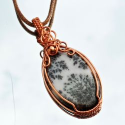 a wire pendant with a dendrite opal, a gift for christmas, new year, a gift to relatives