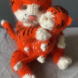Knitted toy little orange tiger