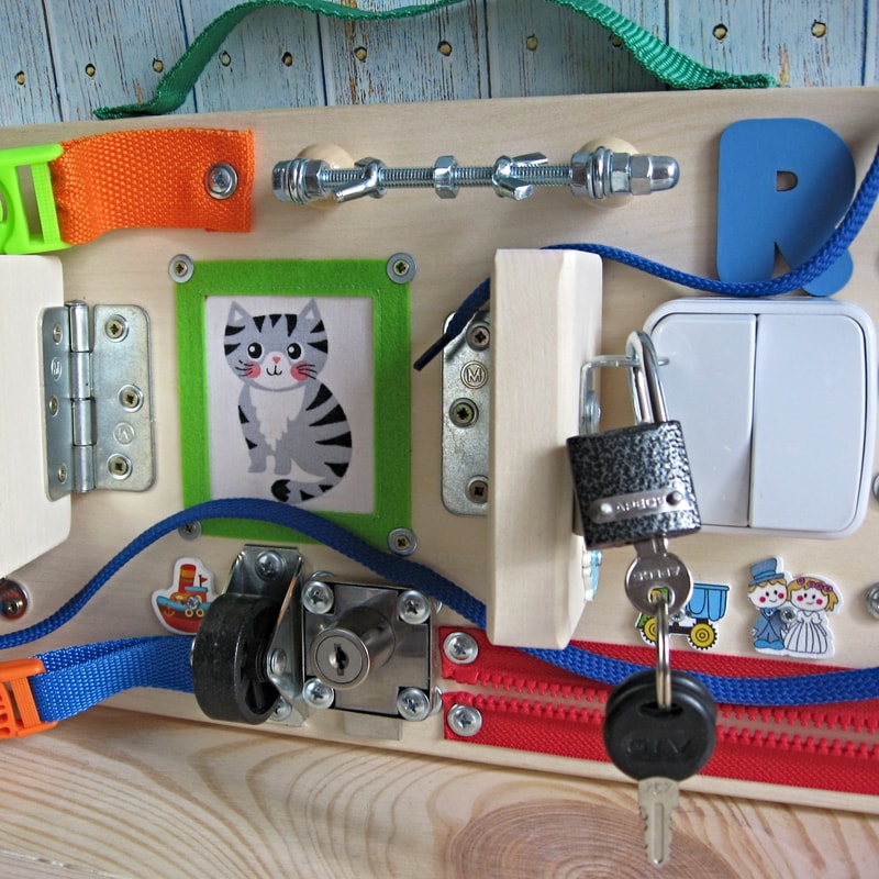 natural-sensory-board-with-buckles-and-zipper-toy-1.jpg