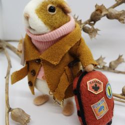Edward Bisquit, needle felted guinea pig who loves to travel