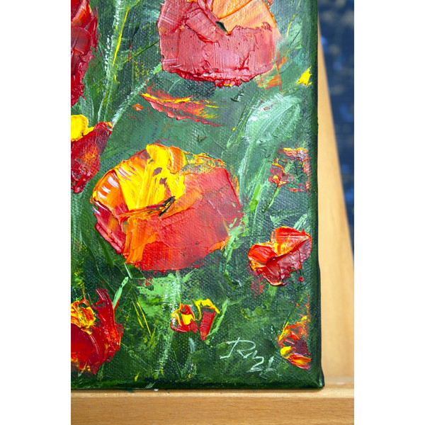 Fragment-oil painting red poppies on a green background