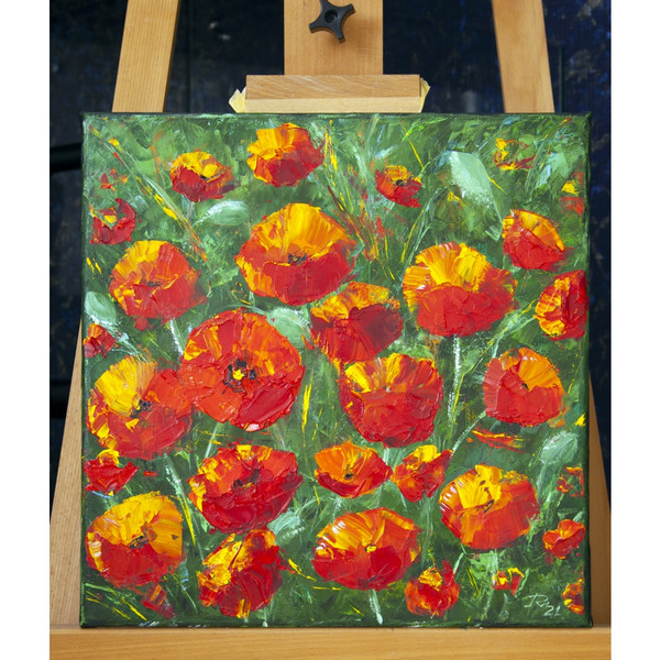 Oil painting red poppies on a green background