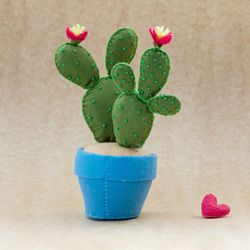 Fake prickly pear cactus plant in a pot for nursery decor