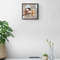 White_cabinet_with_plants_and_books.jpg