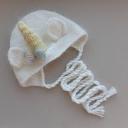 Unicorn newborn bonnet knitting pattern