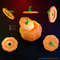 Geometric Paper Pumpkin with cap for sweets different view on a dark background