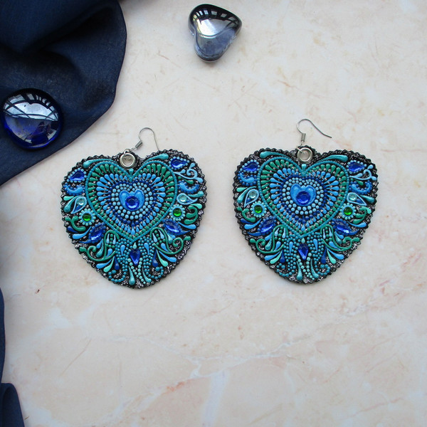 large-leather-earrings-peacock-feather.JPG