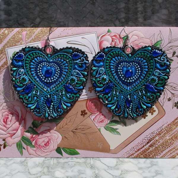 painted-leather-earrings-peacock-feather.JPG