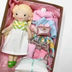 Blonde doll with the set of extra clothes & accessorizes (10 items)
