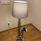 The table lamp made of old saxophone