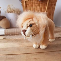 Realistic animal toy lion wool yarn sculpture. Stuffed lion toy. Natural figure of a lion. Big lion toy