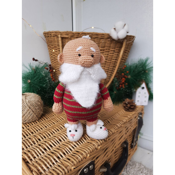 Santa Claus in home clothes cozy Christmas gift.jpg