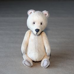 Teddy bear. Miniature teddy bear. Stuffed teddy. Mini handmade plush toy. Cute light yellow teddy