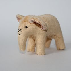 teddy elephant. cute light yellow miniature elephant. mini handmade plush toy. sweet plush toy