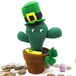 St Patricks day Funny cactus, fake plant in a Leprechaun hat with four leaf clover in pot of gold, st patrick day decor