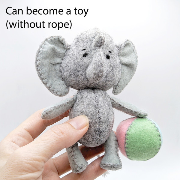 Children's soft toy gray elephant with a ball.jpg