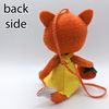 A ginger fox made of felt. View from the back.jpg