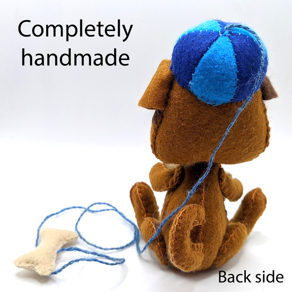 The back of a toy dog made of felt.jpg