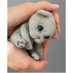 Knitted toy gray cute kitten