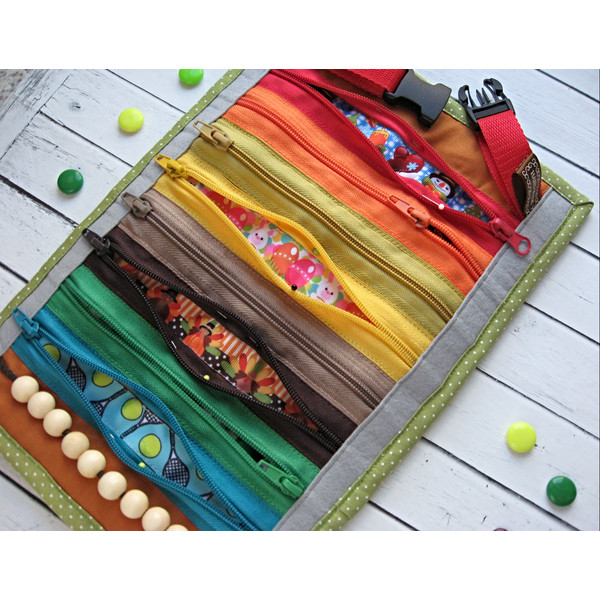 Activity-travel-toy-with-zippers-1