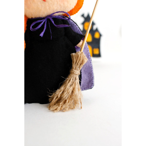 Felt witch broomstick close-up view