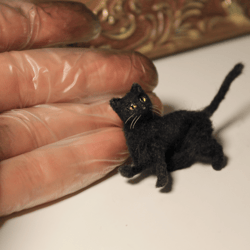 1  Black cat so very move. Realistic figurine. Miniature and so tiny