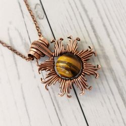 Wire wrapped copper pendant with natural Tigers Eye. Star necklace with Tigers Eye bead.
