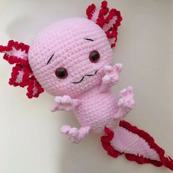 Handmade crochet axolotl plushie, perfect gift for kids. Soft and cuddly, this adorable toy will bring joy and comfort.