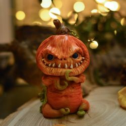 Scary pumpkin. Collectible toy made of polymer clay.