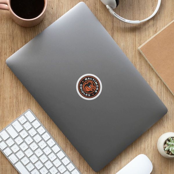 sticker-mockup-featuring-a-laptop-on-a-wooden-desk-33602_compressed.jpg