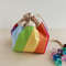 Rainbow dice bag with pockets.jpeg
