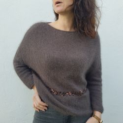 Angora sweater with sequins.