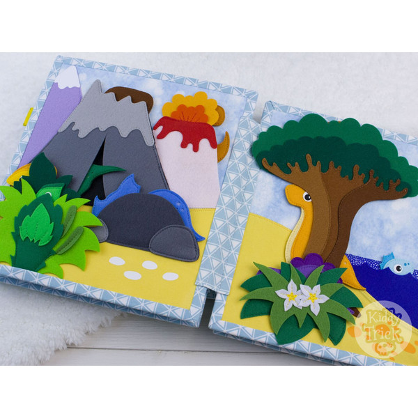 felt book page with dinosaurs