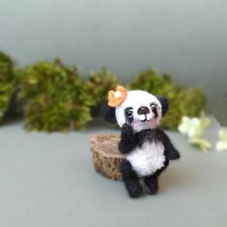miniature knitted toy for collection and interior realistic panda