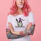portrait-of-young-amazed-beautiful-pink-haired-lady-with-tattooed-hands-wears-in-white-t-shirt-blows-gum-ball-looking-to-the-left-in-surprise-stands-with-copy-s