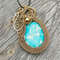 Fancy bronze pendant with sky blue stone 4.jpg