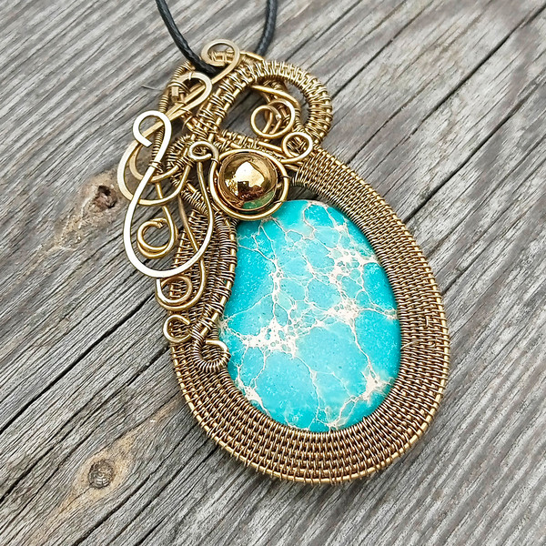 Fancy bronze pendant with sky blue stone 4.jpg