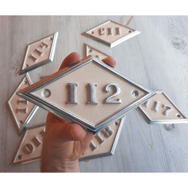 112 apartment number sign metal rhomb
