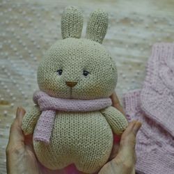 Gift for pregnant women includes knitted bunny and socks