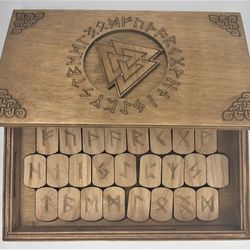 Rune set of Elder Futhark in a box with a hidden lock Secret of Valknut. Wooden runes in a box with puzzle lock.
