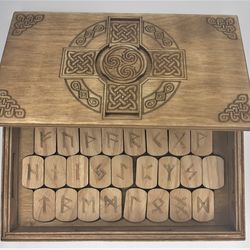 Rune set of Elder Futhark in a box with a hidden lock Secret of Celtic Cross. Wooden runes in a box with puzzle lock.