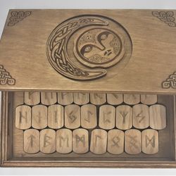 Rune set of Elder Futhark in a box with a hidden lock Secret of Sun and Moon. Wooden runes in a box with puzzle lock.