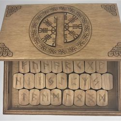 Rune set of Elder Futhark in a box with a hidden lock Secret of Helm of Awe. Wooden runes in a box with puzzle lock.