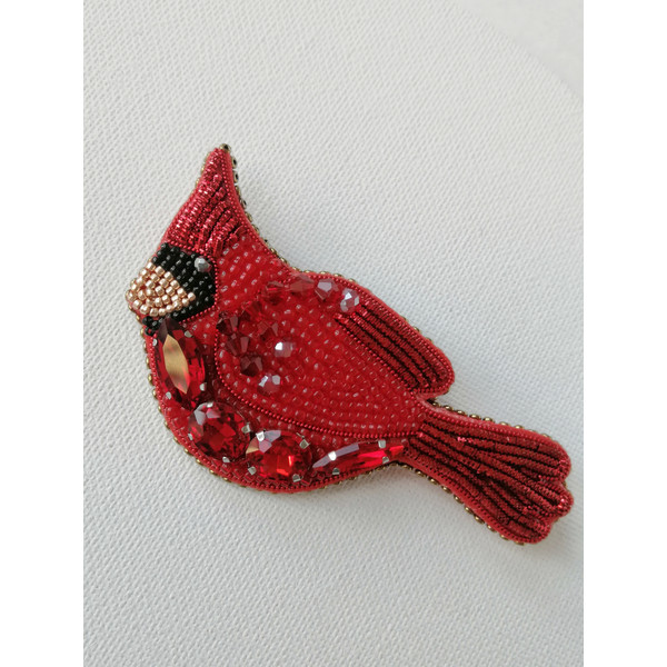 Red 2025 cardinal brooch