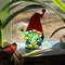 Handmade-stained-glass-sun-catcher-8"-on-stand-gnome-with-a-Christmas-tree-in-his-hands-red-cap-on-his-head-large-blond-beard-blue-coat-green-mittens-and-boots