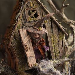 Half scale handcrafted witch house with 2 witches