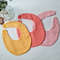 a set of double-sided personalized bibs for baby's drool.jpg