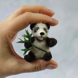Small Panda with bamboo. Realistic miniature toy. Great gift for pet lovers