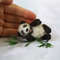 realistic-toy-of-panda-with-bamboo.jpg